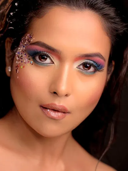 A portrait that captures the fun and playful energy of this creative makeup look.