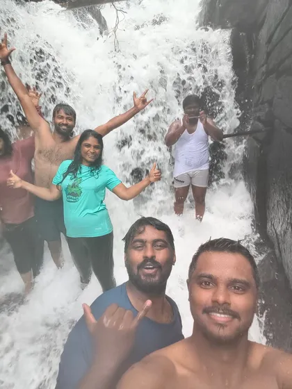It's all about the fun and the friends you make along the way. Here's our group having a blast under a refreshing waterfall. Our trips are perfect for solo travelers and groups alike, with certified leads ensuring a safe and friendly vibe.