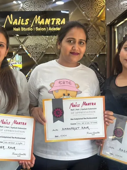 A group of happy students posing with their certificates after successfully finishing their professional training. It’s always a proud moment for us to see our students graduate.
