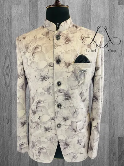 For a client who wanted something different, I created this floral print Bandhgala. The monochrome grey and white pattern is both artistic and masculine. It shows that you can embrace bold prints while maintaining a sophisticated and tailored aesthetic.