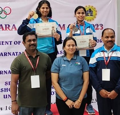 Rohita and Raksha on the podium after winning Gold and Bronze respectively in the 25m Sports Pistol event.