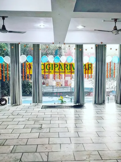 Our studio decorated for our one-year anniversary celebration. It's more than a yoga space; it's a home for our parivaar.