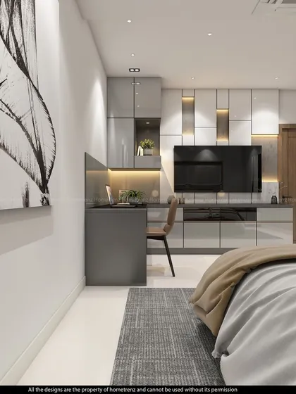 This master bedroom TV unit is sleek and modern, with integrated storage and a dedicated workspace. The grey and white color scheme is both calming and sophisticated.