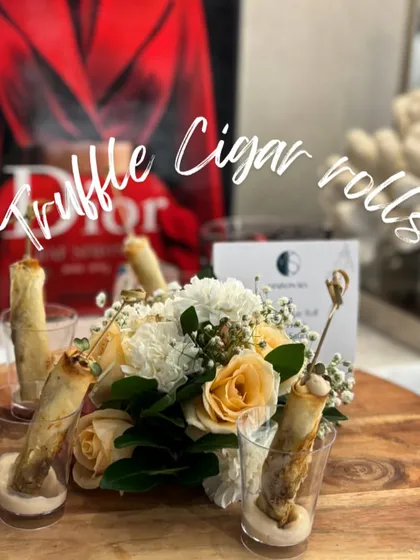 My signature Truffle Cigar Rolls are a true indulgence. Each roll is a crisp, golden shell filled with a creamy, aromatic truffle mixture, served elegantly to delight your guests.