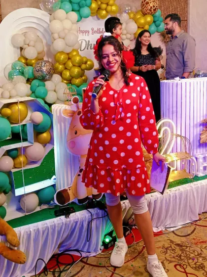 I believe every party should be full of life, and this jungle-themed birthday was no exception. Here I am, mic in hand, ready to kick off the fun and games for the kids and family.