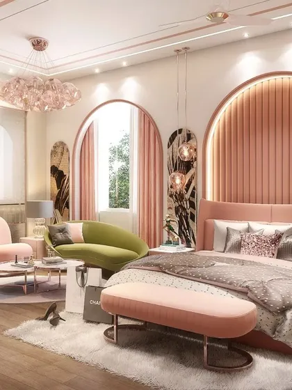 A daughter's room designed for a client in Agra, where pink is celebrated in all its glory. The arched, upholstered headboard and matching seating create a playful yet sophisticated space that is full of personality.
