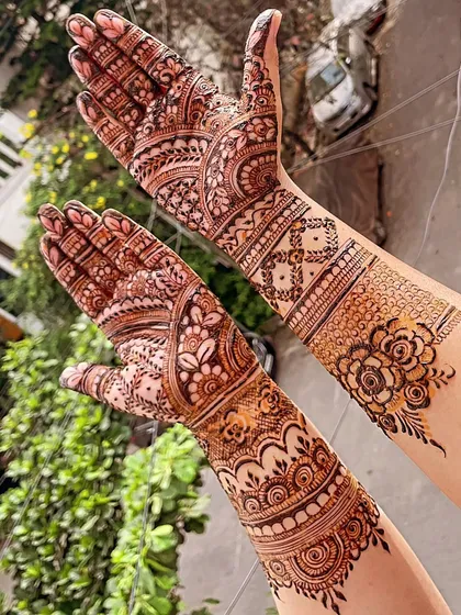 The reverse side of a traditional Indian henna design. I love creating patterns that flow and connect around the arm.
