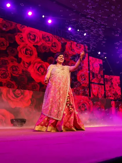 A beautiful still from a solo performance, with bubbles and roses creating a magical atmosphere. We help you plan all the details for a perfect showstopper.