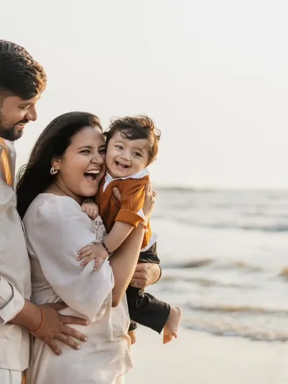 There's nothing like the golden light of a Mumbai beach at sunset. This family photoshoot was full of laughter and play, capturing the beautiful bond between parents and their one-year-old against the backdrop of the sea.