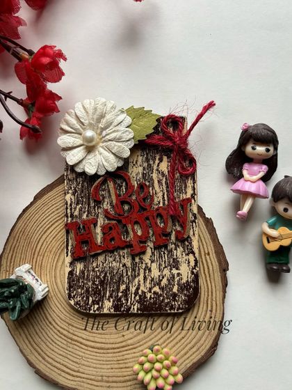 "Be Happy." A beautiful, rustic wooden magnet with a textured finish and a simple, powerful message.
