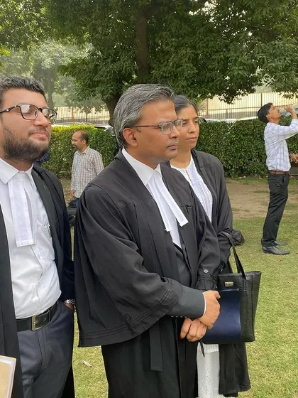 With my legal team, speaking to a journalist from News 18 about developments in a case after a court hearing.