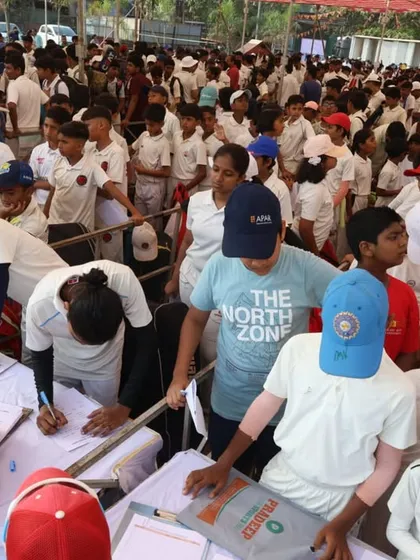 The determination is visible on the faces of these young players as they fill out their forms for the selection trials.