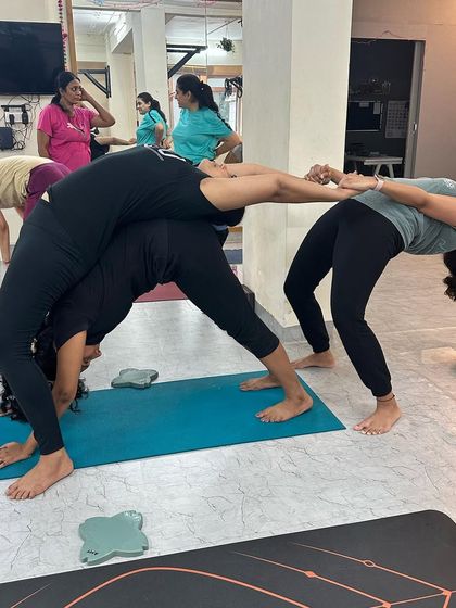 This partner backbend variation shows how we use teamwork to build trust and explore deeper expressions of familiar poses.