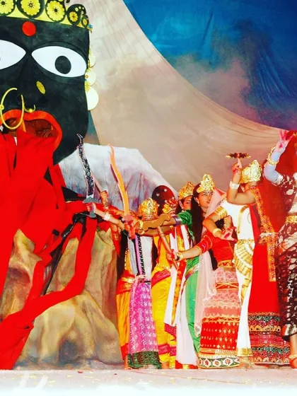 We love bringing cultural stories to life on stage. This image captures a powerful moment from an Indian musical theatre production, featuring elaborate costumes and a dramatic, custom-designed stage prop.