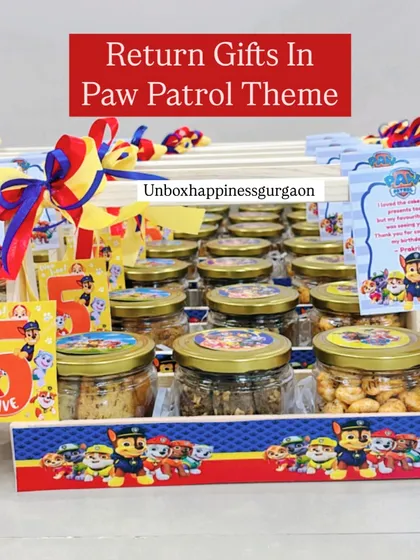 This image highlights the vibrant 'Paw Patrol' theme, with custom-printed baskets and character stickers on the treat jars.
