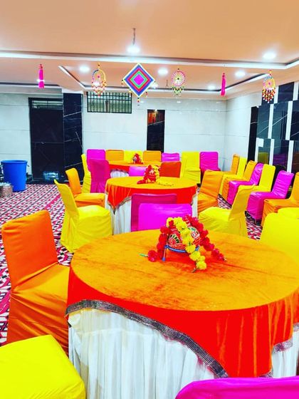 Another angle of the indoor hall, showing the spacious layout and the vibrant, coordinated decor.