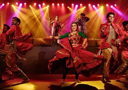 Energy and color fill the stage during a folk-dance performance. Our live studio nights often incorporate vibrant dance segments that complement the musical acts, adding another layer of dynamic entertainment.