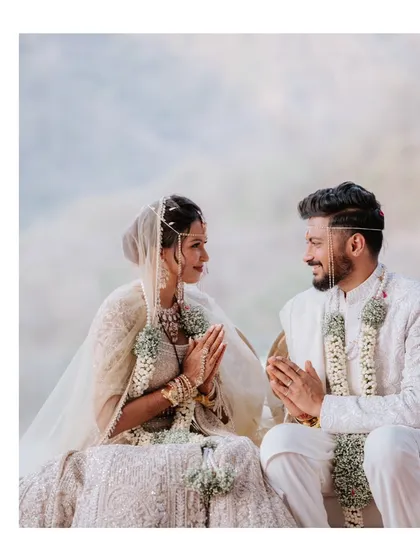 A sacred union in Rishikesh, with the tranquil Ganges flowing in the background. This image captures the spiritual and serene atmosphere of a wedding nestled in the mountains.