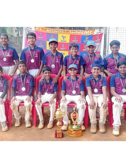 The U-12 Maroon Team, proud runners-up of the PTPL 2024. Dressed in their team jerseys, they celebrate a fantastic tournament performance with their medals and trophy.