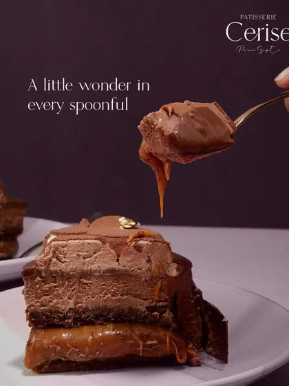 This is what I call a spoonful of wonder. The combination of airy chocolate mousse and a drip of luscious caramel creates a moment of pure, unadulterated indulgence.