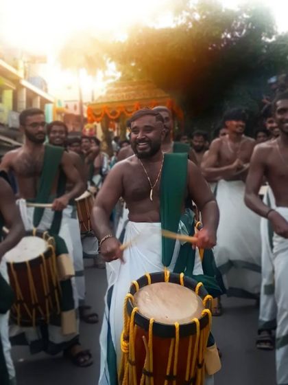 Leading the procession with passion. The joy on our faces reflects the energy we feel from the music and the crowd.