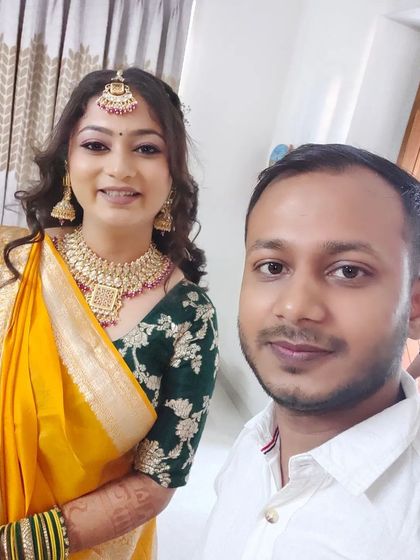 A happy selfie with the bride after finishing her Haldi look. Seeing my clients happy is my biggest motivation.