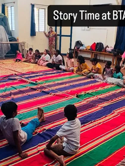 A wide shot of our Katha Yoga session, where children gather on colorful mats to listen to ancient tales. This unique activity is part of our All-Rounder camp.