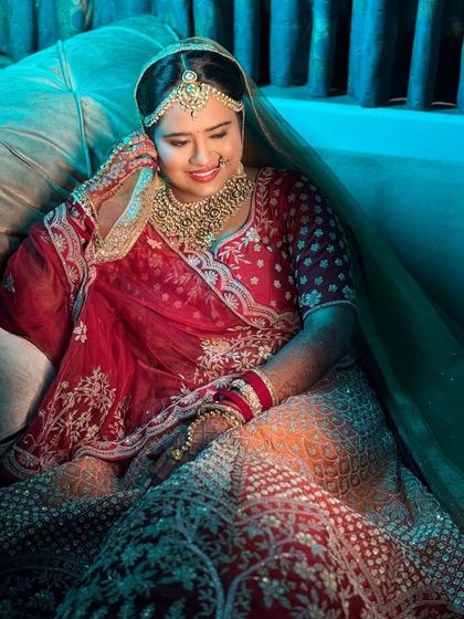 A candid moment captured under dramatic lighting. The makeup holds up beautifully, proving its quality and long-lasting finish.