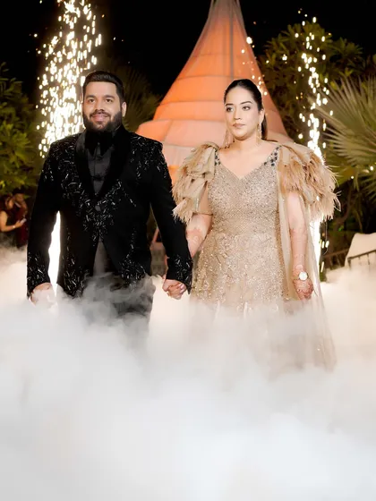 Another angle of the couple's grand, smoky entrance at their Sangeet.