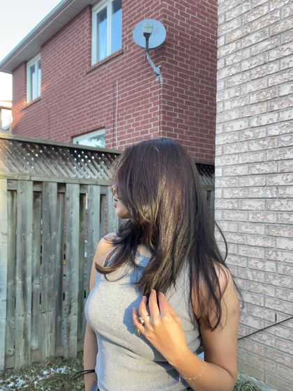 A candid moment from the same series, with my hair covering my face.