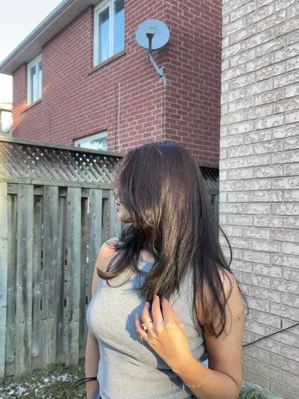 A candid moment from the same series, with my hair covering my face.