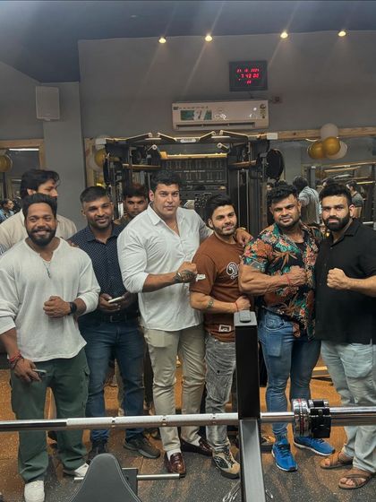 Surrounded by my gym family and supporters. Building a strong physique also means building a strong community.