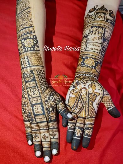 A full view of the personalized bridal mehendi, showing how the story flows from the palms up the arms, complete with intricate patterns and meaningful figures.