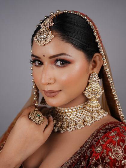 This stunning bridal look was created entirely by a student. The confidence in their work is evident, and they are ready for the professional world.