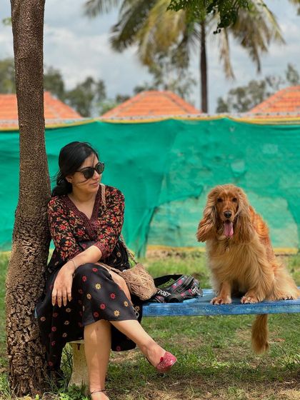 A quiet moment with Posto at the dog park, enjoying the shade and a little rest.