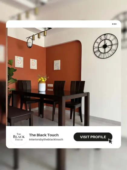 A promotional image featuring the bold orange dining nook from one of our projects, emphasizing our confident use of color.