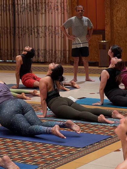Learning under the watchful eye of my Guru. His presence in the room was transformative, teaching us so much more than asana. He taught with humility, humor, and profound wisdom.