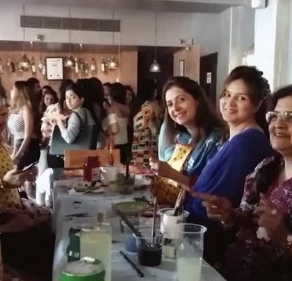 The happy, smiling faces during a paint party are what I work for. The atmosphere is always full of laughter and conversation as everyone gets comfortable with their brushes. It is a refreshing break that allows people to connect in a relaxed setting.