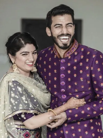 Capturing pure, unscripted joy is what I love most. This candid shot from a couple's portrait session shows a moment of genuine laughter, reflecting their unique connection. My approach is to create a relaxed atmosphere where you can be yourselves, allowing for authentic wedding photography.