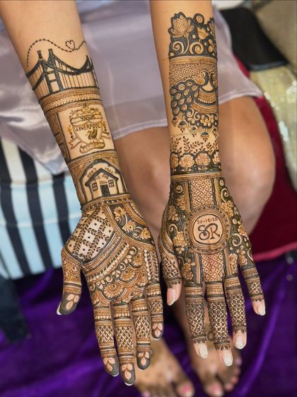 The complete storytelling mehendi, showing how we can use the entire arm as a canvas to narrate a couple's unique journey together.