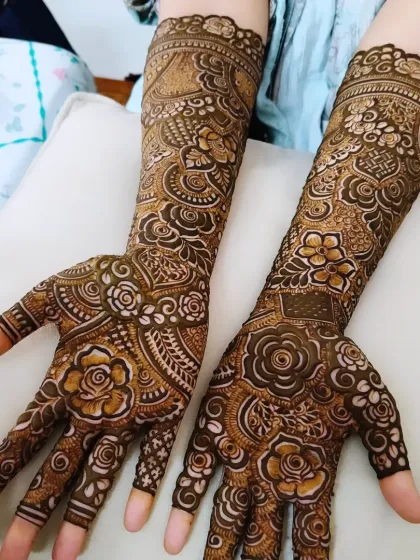 This design showcases my signature style of mixing bold, shaded florals with delicate, fine-line patterns to create depth and contrast.