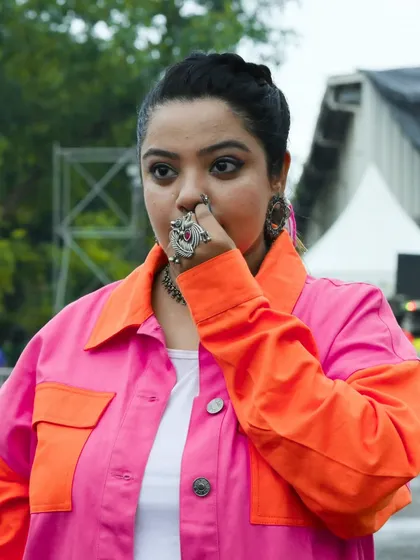 A candid, thoughtful pose. Every event is a mix of high energy and focused moments.