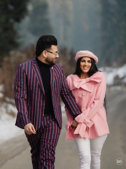 A close-up of a happy couple, their smiles as bright as the snowy landscape around them. We aim to capture the genuine joy and excitement of exploring a new, beautiful place together during your pre-wedding photoshoot.