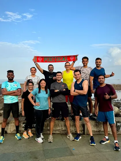 Our squad showing some love for their favorite team while getting their run in. We're a diverse group with a shared passion for fitness.