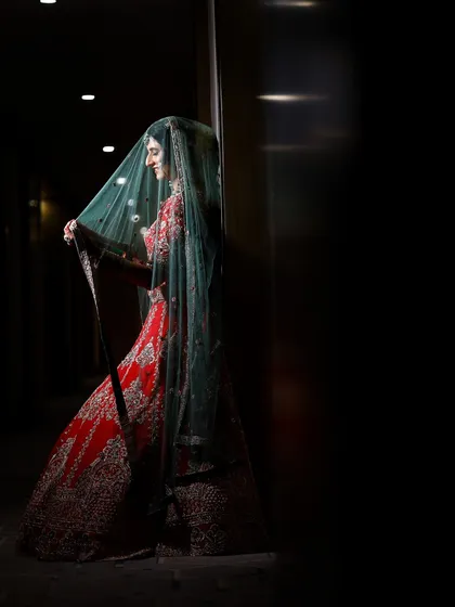 A dramatic and artistic portrait of the bride with her veil. I use shadows and light to create moody and timeless images.