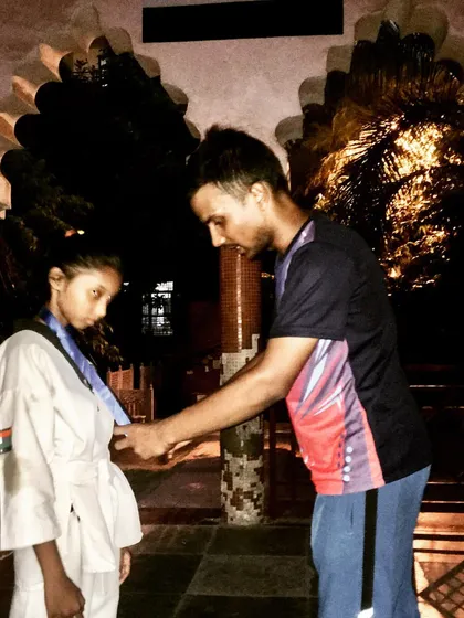 Awarding a medal to a deserving student. This is the moment all the hard work is for.