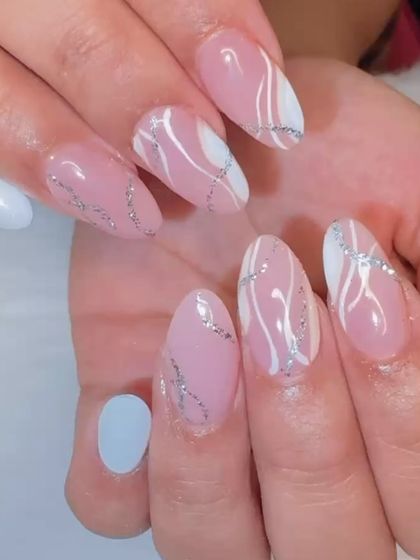 A beautiful abstract design with pink, white, and silver glitter swirls.