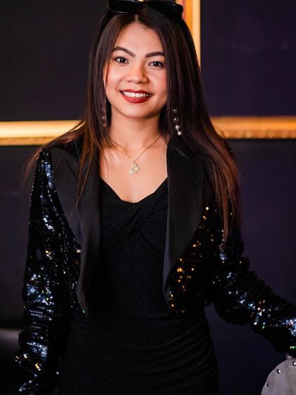 A guest posing at the bar.