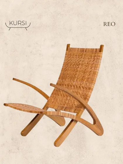The 'Reo' easy chair is a study in sculptural simplicity. The frame is crafted from curved teak wood, with a woven seat and back that create a light yet durable form, perfect for lounging.