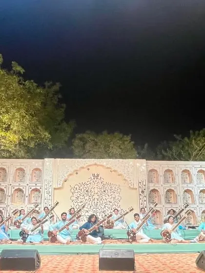 The Sitar Symphony on stage in Ahmedabad. The beautiful stage setup and the collective energy of the musicians created a magical evening.